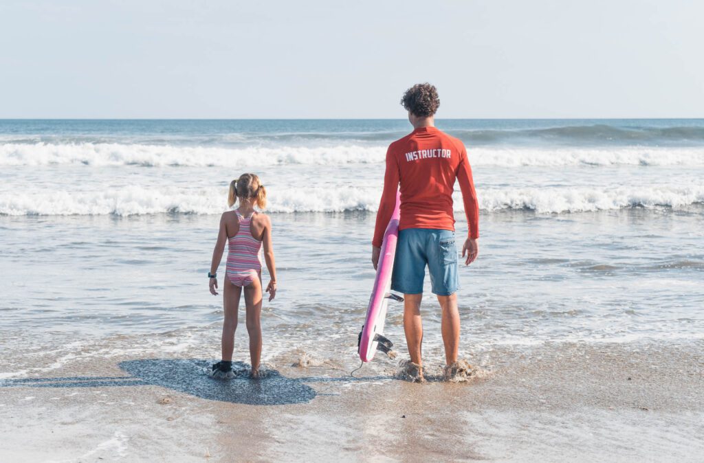 surf instructor and student